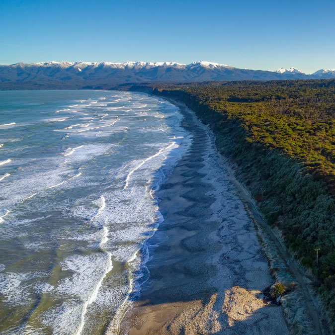 Blue Cliffs beach in Southland New Zealand. Part of an itinerary by Legend Adventures car rental in Queenstown New Zealand